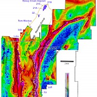 SkyTEM data from the northern part of Eskay’s project area. Cool colors are resistive rocks. Warm colors are conductive rocks. The contact between highly conductive Bowser Lake Group sedimentary rocks and the more resistive Hazelton Group volcanic rocks is readily apparent, in orange (solid where mapped and dashed where inferred; thick with teeth denotes thrust faulting). It is along this contact and areas of Hazelton Group rocks below that Eskay Mining considers prospective for precious metal-rich VMS mineralization. Thus, the eastern side of the Eskay anticline is considered highly prospective from Jeff to the Eskay Creek mine.